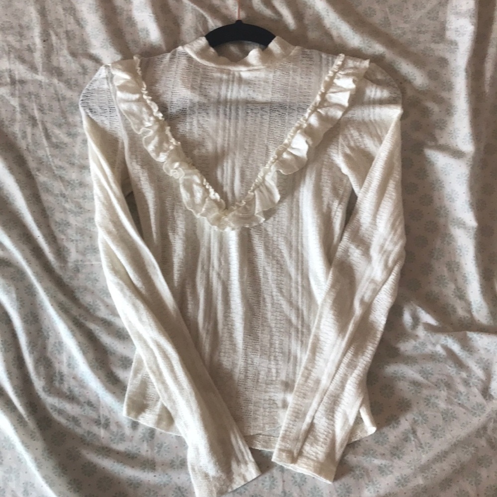Frill detail cream top